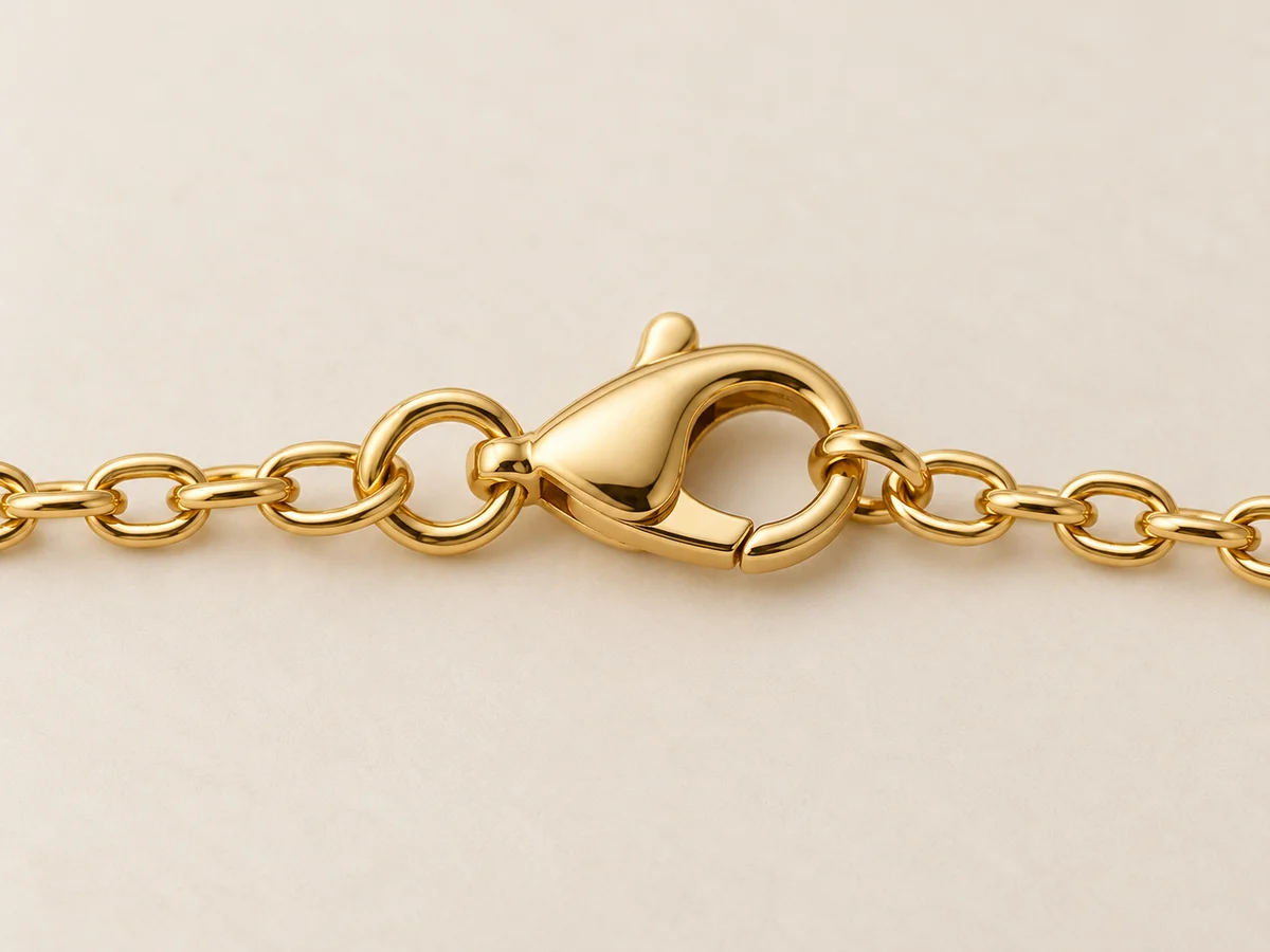 Lobster clasp and mating ring connected to the necklace chain