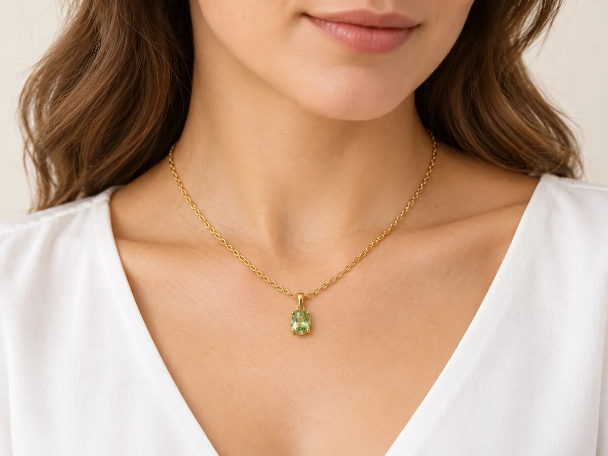Illustrative necklace wearing position with a white neckline