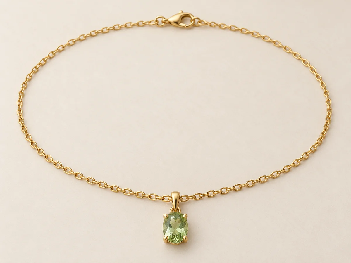 Product reference showing the chain, clasp and green pendant together