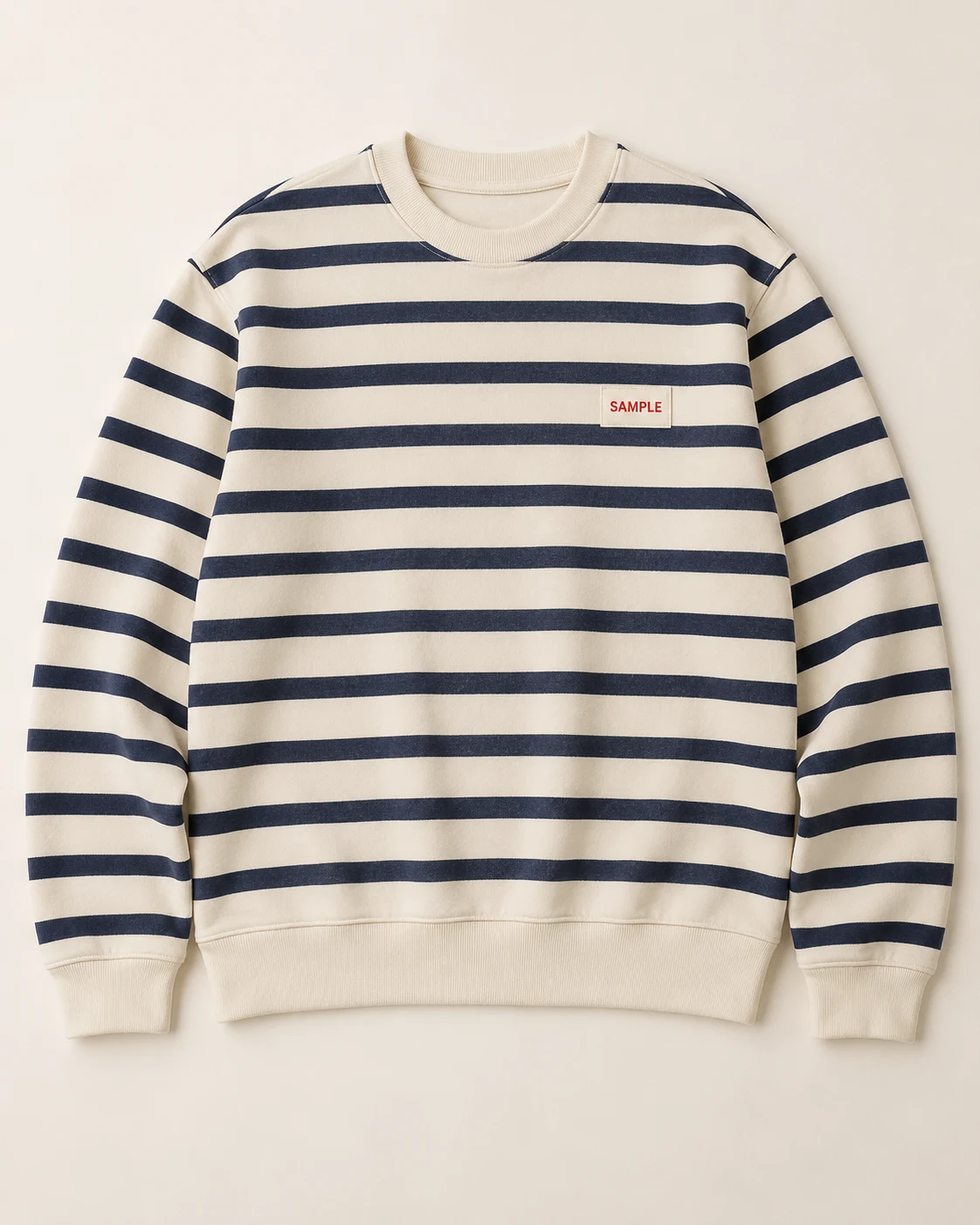 Temsili ürün referansı: kırmızı SAMPLE etiketli, krem ve lacivert çizgili sweatshirt